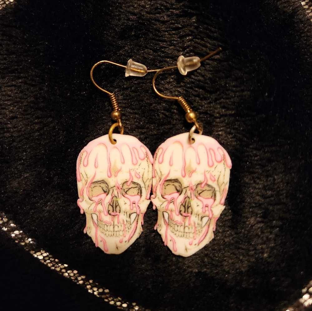 Dripping skull earrings